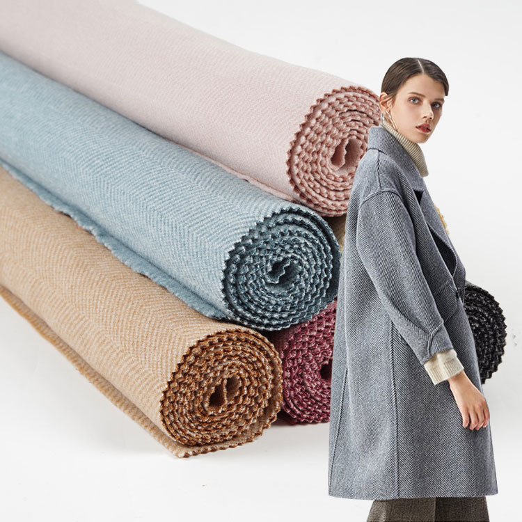 De middenwollen stof met visgraatmotief is een populair product geworden in de textielindustrie